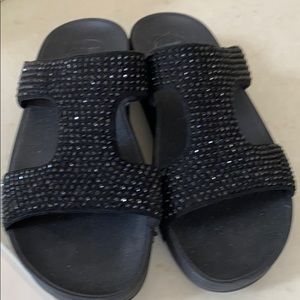 Black rhinestone FitFlop slides